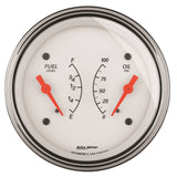 Traditional incandescent lighting illuminates around the perimeter of the dial