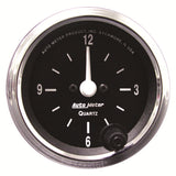 Traditional incandescent lighting illuminates around the perimeter of the dial