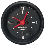 Traditional incandescent lighting illuminates around the perimeter of the dial